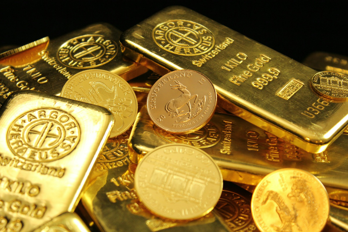 Closeup of gold coins and bars